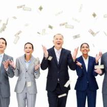 photo of business people in suits with paper money floating down