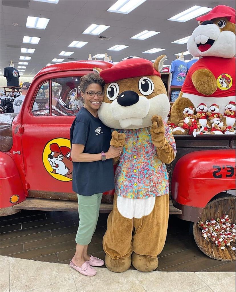 4. Buc-ee’s mascot, a buck-toothed beaver (after the “Beaver” founder) poses with a patron.