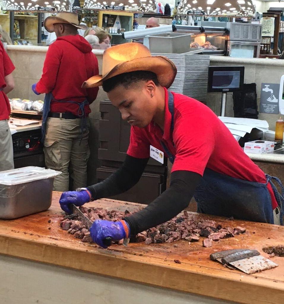 7. An employee at the Buc-ee’s in Florence, South Carolina chops brisket BBQ, one of the best items in the store.